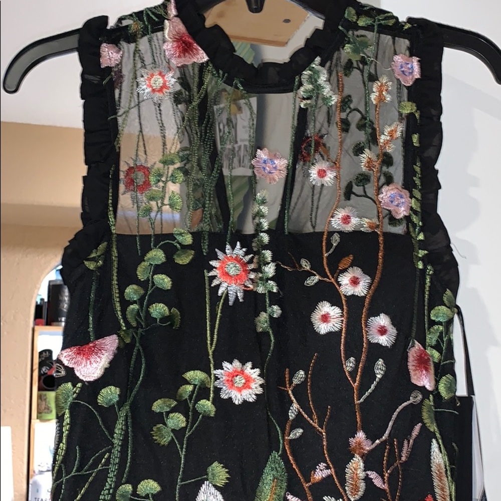 Embroidered floor length gown.